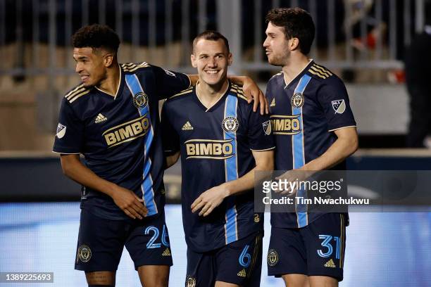 Nathan Harriel, Déniel Gazdag and Leon Flach of Philadelphia Union celebrate a goal by Gazdag during the second half against Charlotte FC at Subaru...