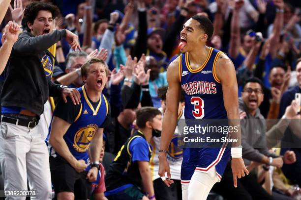 Jordan Poole of the Golden State Warriors reacts after making a three point basket against the Utah Jazz in the fourth quarter at Chase Center on...