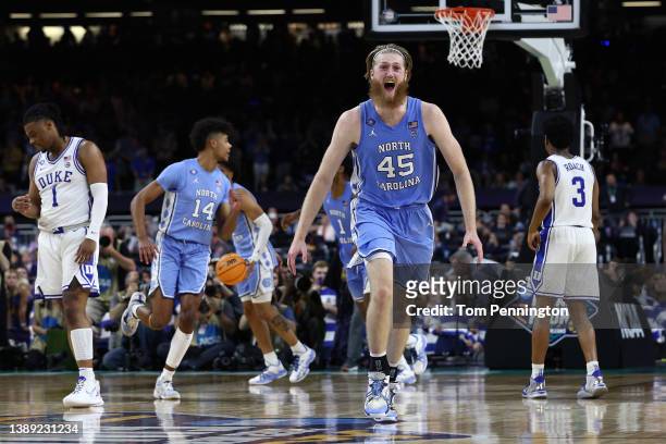 Brady Manek of the North Carolina Tar Heels celebrates after defeating the Duke Blue Devils 81-77 in the 2022 NCAA Men's Basketball Tournament Final...