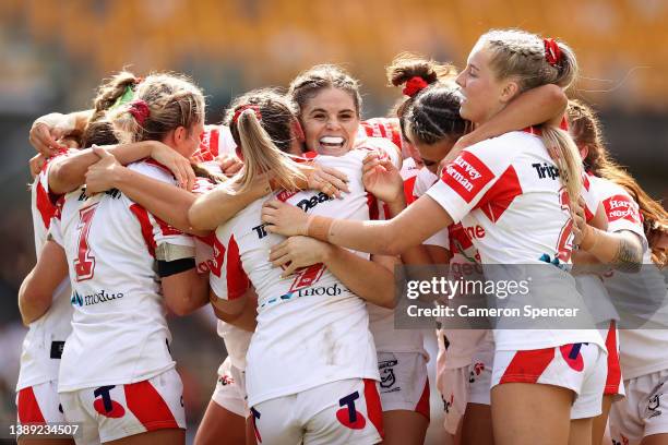 Talei Holmes of the Dragons and team mates celebrate winning the NRLW Semi Final match between the St George Illawarra Dragons and the Gold Coast...