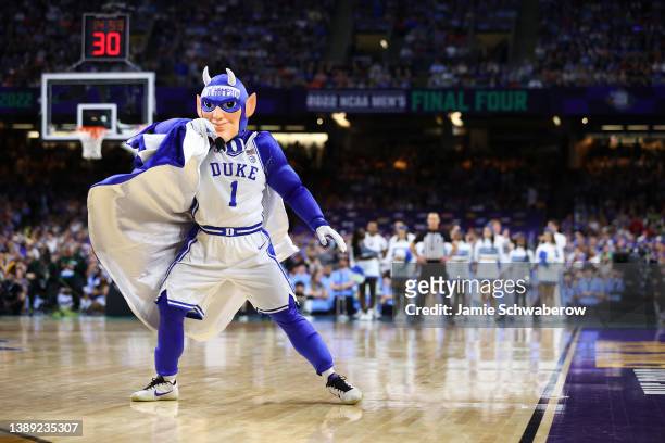 The Duke Blue Devils mascot performs against the North Carolina Tar Heels during the first half in the semifinal game of the 2022 NCAA Men's...