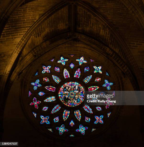 stained glass window of seville cathedral - seville cathedral stockfoto's en -beelden
