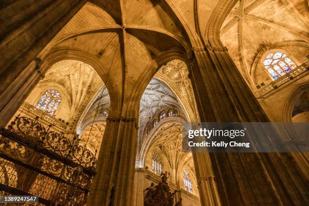 interior of seville cathedral - seville cathedral stockfoto's en -beelden
