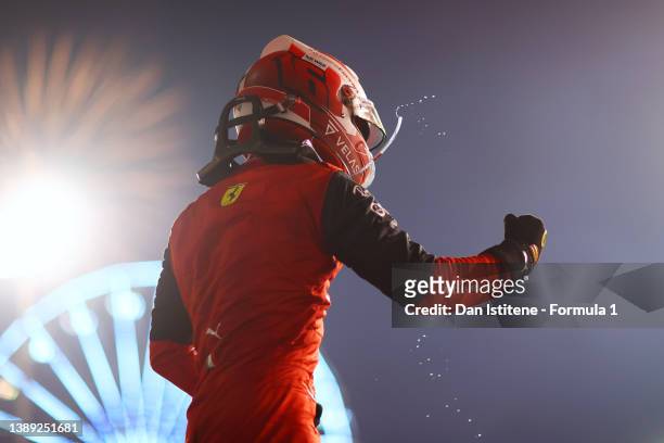 Race winner Charles Leclerc of Monaco and Ferrari celebrates in parc ferme after the F1 Grand Prix of Bahrain at Bahrain International Circuit on...