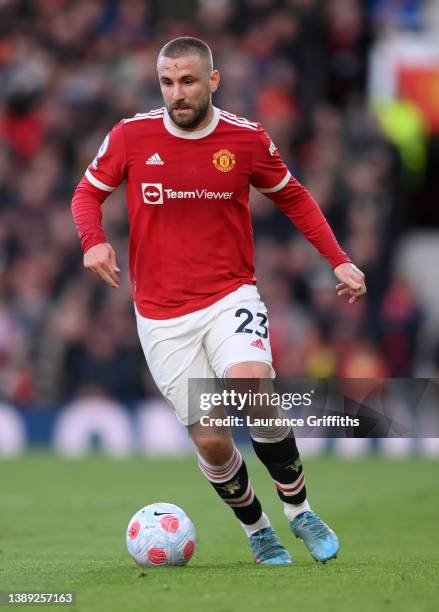 Luke Shaw of Manchester United runs with the ball during the Premier League match between Manchester United and Leicester City at Old Trafford on...