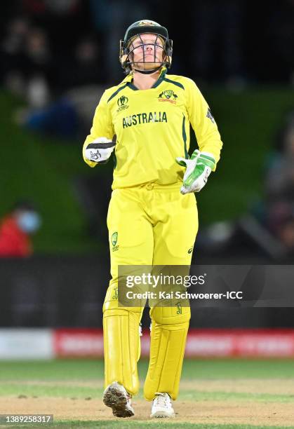 Alyssa Healy of Australia reacts after fielding during the 2022 ICC Women's Cricket World Cup Final match between Australia and England at Hagley...
