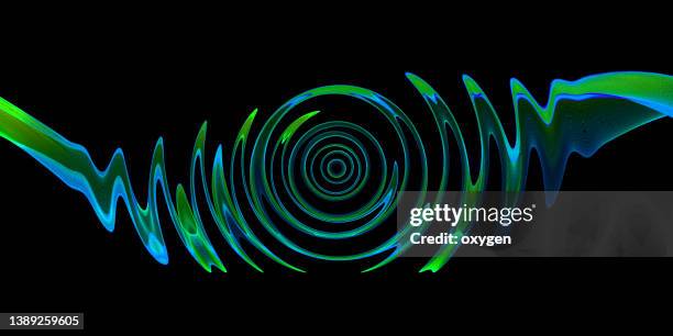 abstract wave swirl aqua green magical ribbon lines on black background. morphing curve shape - magic eye fotografías e imágenes de stock