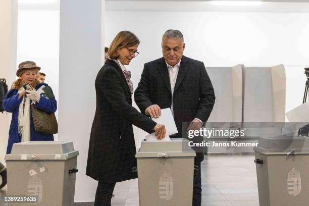 Hungarian Prime Minister Viktor Orban and his wife Aniko Levai cast their ballots during the general parliamentary elections on April 3, 2022 in...