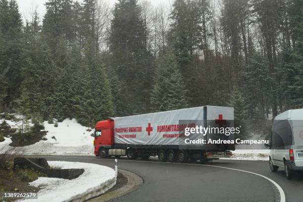 Romanian Red Cross trucks carry humanitarian aid, on April 2, 2022 in the Carpathian Mountains, Ukraine. Since Russia's full-scale armed invasion of...