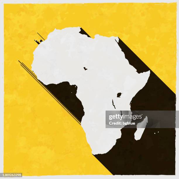 africa map with long shadow on textured yellow background - reunion island 幅插畫檔、美工圖案、卡通及圖標