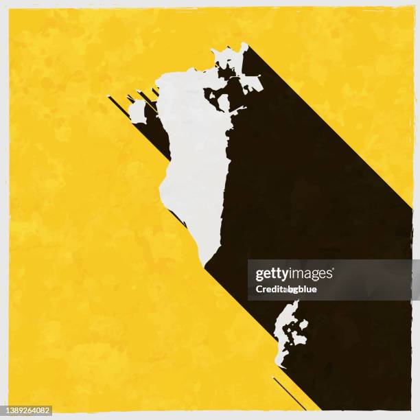 bahrain map with long shadow on textured yellow background - bahrain map stock illustrations