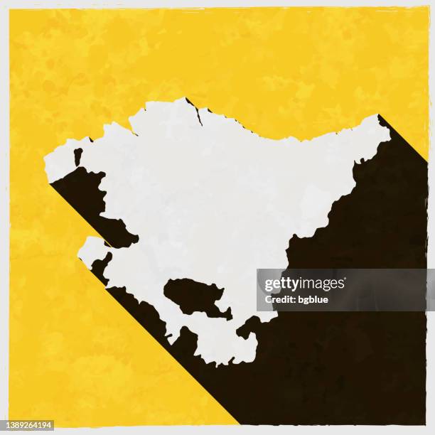 basque country map with long shadow on textured yellow background - bilbao spain stock illustrations