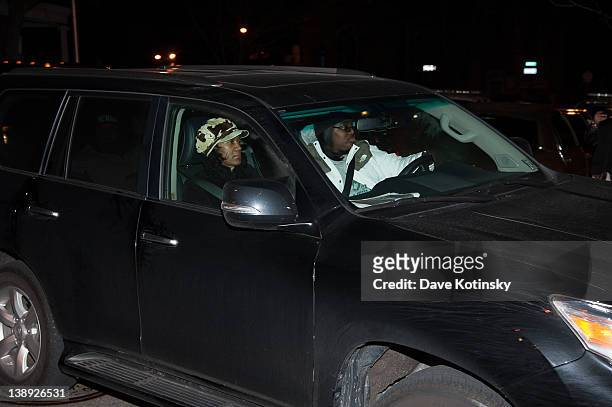 Guests arrive as Whitney Houston's body arrives to the Whigham Funeral Home on February 13, 2012 in Newark, New Jersey.