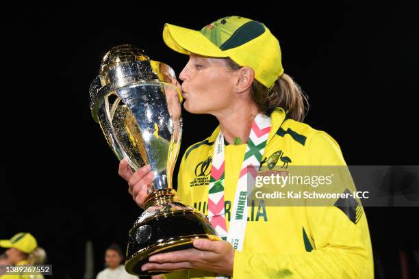 Meg Lanning of Australia kisses the Women's Cricket World Cup trophy after the 2022 ICC Women's Cricket World Cup Final match between Australia and...