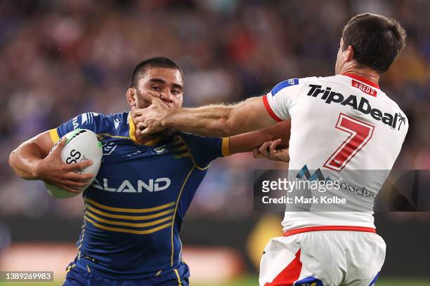 Isaiah Papali'i of the Eels is tackled bu Ben Hunt of the Dragons during the round four NRL match between the Parramatta Eels and the St George...