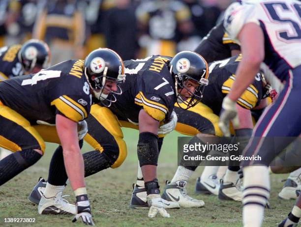 Offensive tackle Marvel Smith and tight end Jerame Tuman of the Pittsburgh Steelers look across the line of scrimmage at the New England Patriots...