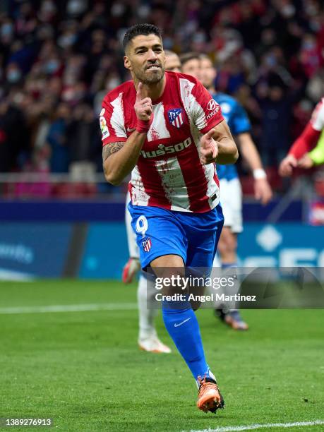 Luis Suarez of Atletico de Madrid celebrates after scoring their team's second goal during the LaLiga Santander match between Club Atletico de Madrid...