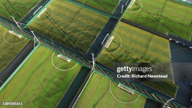 football training ground - sports field fence stock pictures, royalty-free photos & images