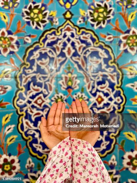 praying hands in ramadan - arab festival stock pictures, royalty-free photos & images