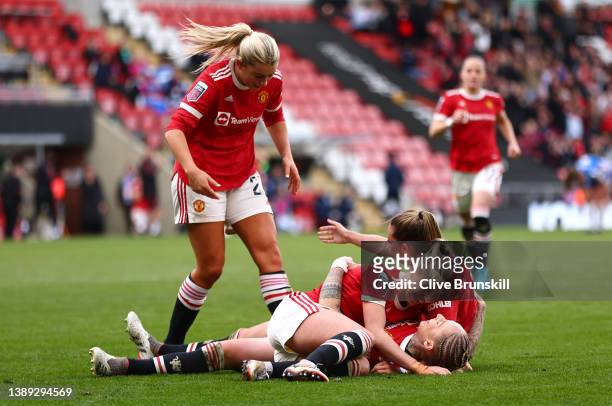 Leah Galton of Manchester United celebrates with team mates Ella Toone, Jackie Groenen and Alessia Russo of Manchester United after scoring their...