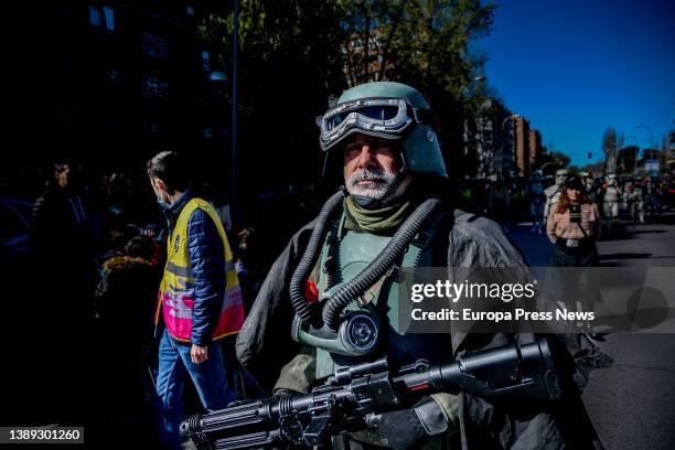 Person dressed as a fighter pilot during a parade inspired by Star Wars characters at a charity event in favor of several local associations in...