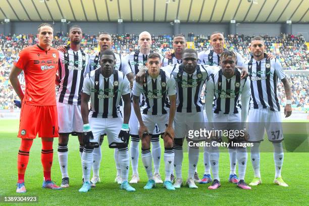 Players of Udinese Calcio line up prior to the Serie A match between Udinese Calcio and Cagliari Calcio at Dacia Arena on April 03, 2022 in Udine,...