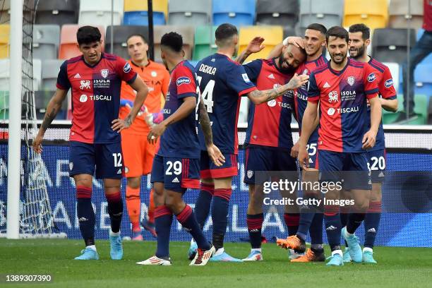 Joao Pedro of Cagliari Calcio celebrates with team-mates after scoring the goal during the Serie A match between Udinese Calcio and Cagliari Calcio...