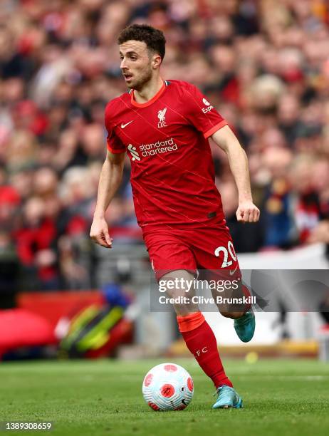 Diogo Jota of Liverpool runs with the ball during the Premier League match between Liverpool and Watford at Anfield on April 02, 2022 in Liverpool,...