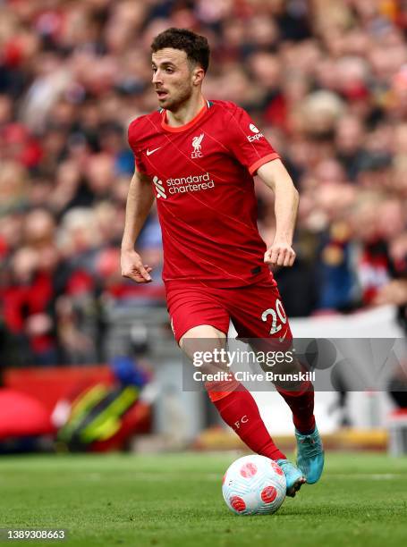 Diogo Jota of Liverpool runs with the ball during the Premier League match between Liverpool and Watford at Anfield on April 02, 2022 in Liverpool,...