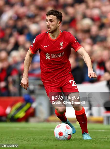 Diogo Jota of Liverpool runs with the ball during the Premier League match between Liverpool and Watford at Anfield on April 02, 2022 in Liverpool,...