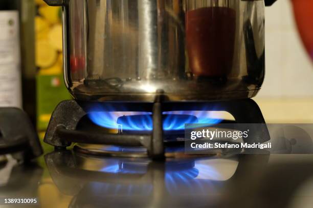 gas in the kitchen - gas cooking stock pictures, royalty-free photos & images