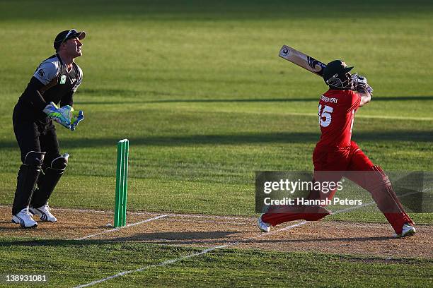 Stuart Matsikenyeri of Zimbabwe pulls the ball away for six runs during the second International Twenty20 match between New Zealand and Zimbabawe at...