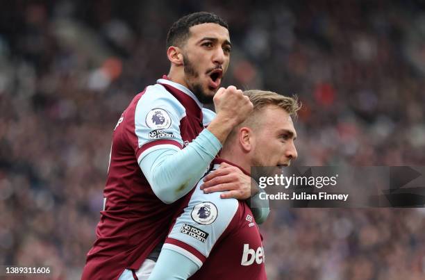 Jarrod Bowen of West Ham United celebrates with teammate Said Benrahma after scoring their side's second goal during the Premier League match between...