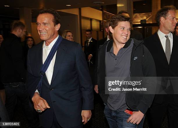 Former Governor of California Arnold Schwarzenegger and Christopher Schwarzenegger arrive at the premiere of Relativity Media's "Act Of Valor" held...