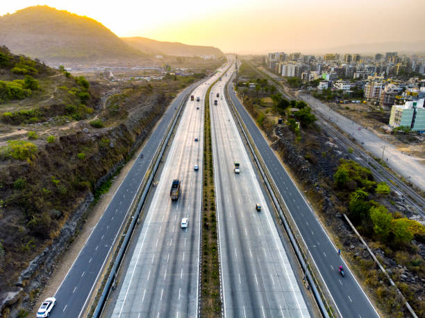 modern multi lane national highway of india - highway stock pictures, royalty-free photos & images
