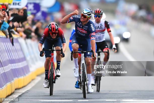 Mathieu Van Der Poel of Netherlands and Team Alpecin-Fenix celebrates at finish line as race winner ahead of Dylan Van Baarle of Netherlands and Team...