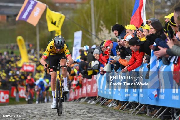 Tiesj Benoot of Belgium and Team Jumbo - Visma competes at Paterberg while fans cheer during the 106th Ronde van Vlaanderen - Tour des Flandres 2022...