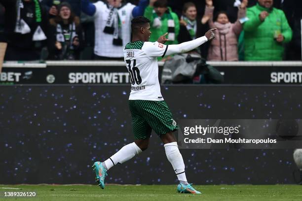 Breel Embolo of Borussia Monchengladbach celebrates after scoring their side's first goal during the Bundesliga match between Borussia...