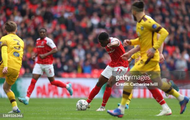 Chiedozie Ogbene of Rotherham United scores their side's third goal during the Papa John's Trophy Final between Rotherham United and Sutton United at...