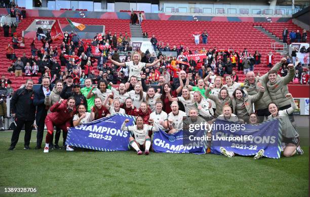 Liverpool Women players and staff celebrate promotion to the Women's Super League after the final whistle of the FA Women's Championship match...