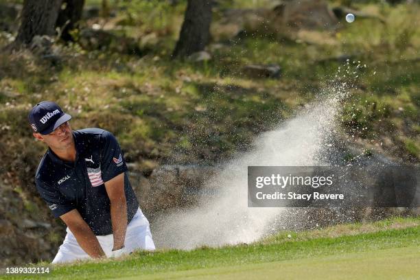 Gary Woodland plays his shot from the bunker on the first hole during the fourth round of the Valero Texas Open at TPC San Antonio on April 03, 2022...