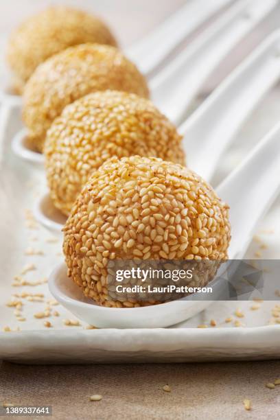 chinese sesame balls with red bean paste - sesame balls stock pictures, royalty-free photos & images