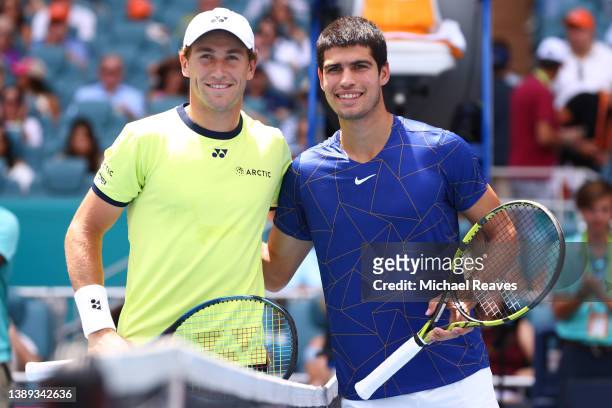 Carlos Alcaraz of Spain and Casper Ruud of Norway pose for a photo before their Men's Singles final during the Miami Open at Hard Rock Stadium on...