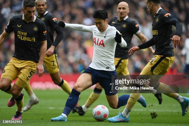 Son Heung-Min of Tottenham Hotspur is surroundeds by the Newcastle defence during the Premier League match between Tottenham Hotspur and Newcastle...