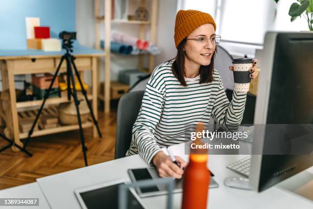 design professional using graphics tablet on desk in studio - graphic designer stock pictures, royalty-free photos & images