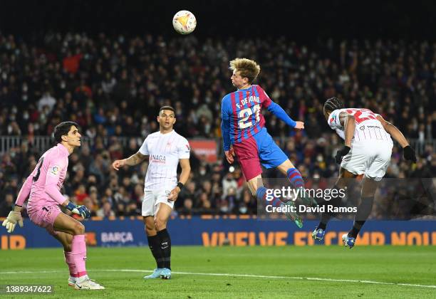 Frenkie de Jong of FC Barcelona heads the ball towards goal during the LaLiga Santander match between FC Barcelona and Sevilla FC at Camp Nou on...