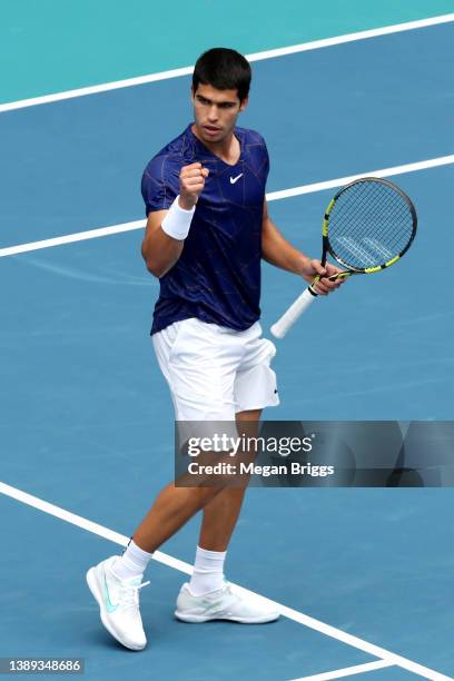 Carlos Alcaraz of Spain reacts during his match against Casper Ruud of Norway in the men's singles final on day 13 of the Miami Open at Hard Rock...