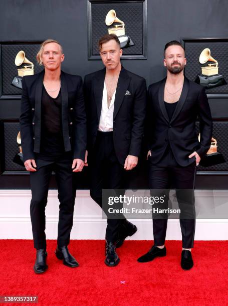 Tyrone Lindqvist, James Hunt, and Jon George of Rüfüs Du Sol attend the 64th Annual GRAMMY Awards at MGM Grand Garden Arena on April 03, 2022 in Las...