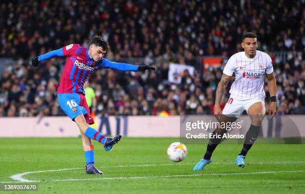 Pedri of FC Barcelona scores their sides first goal during the LaLiga Santander match between FC Barcelona and Sevilla FC at Camp Nou on April 03,...