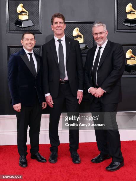 Doug Besterman, Cinco Paul, and Scott M. Riesett attend the 64th Annual GRAMMY Awards at MGM Grand Garden Arena on April 03, 2022 in Las Vegas,...